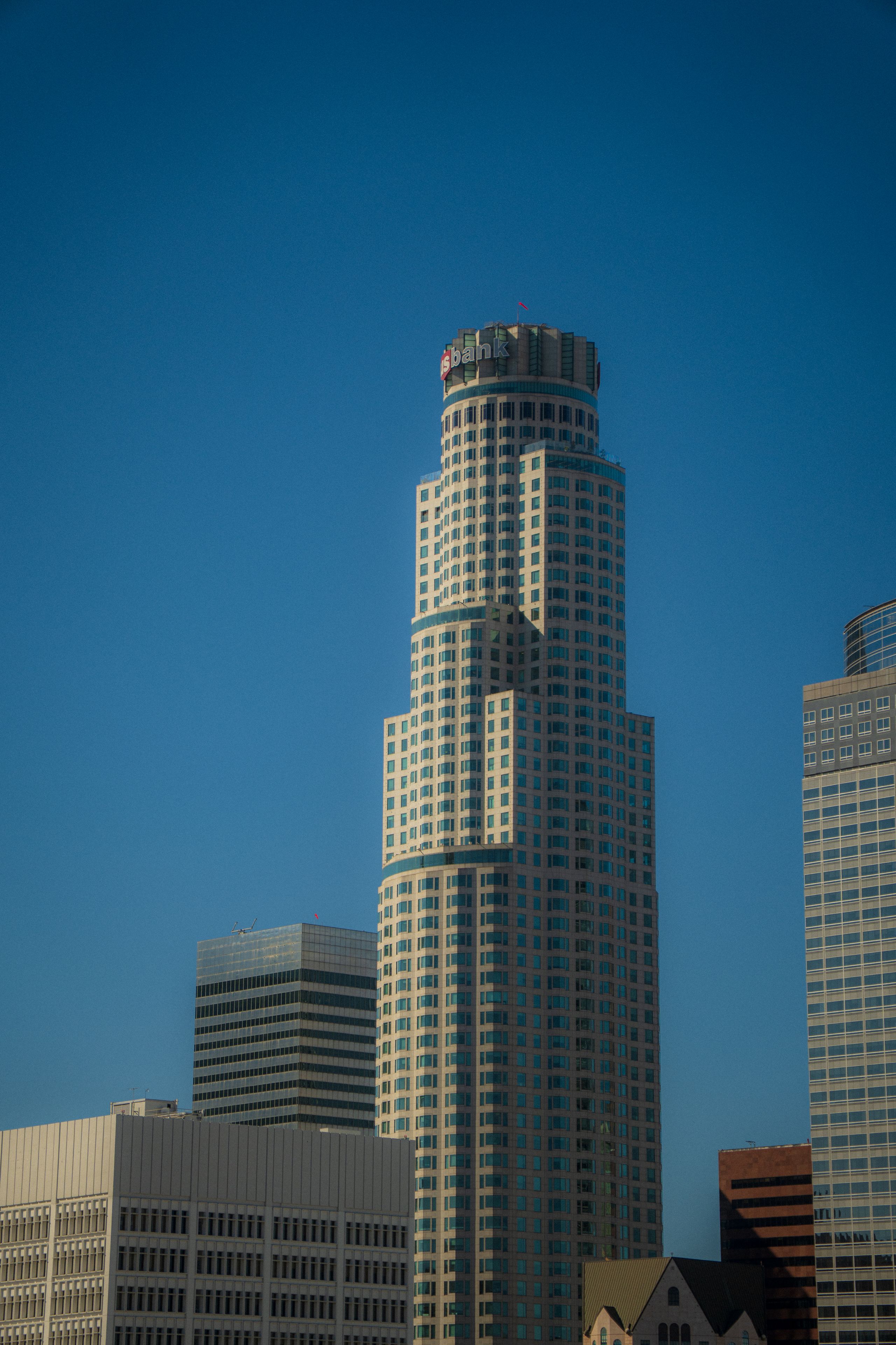 US Bank Tower rising against a deep blue sky