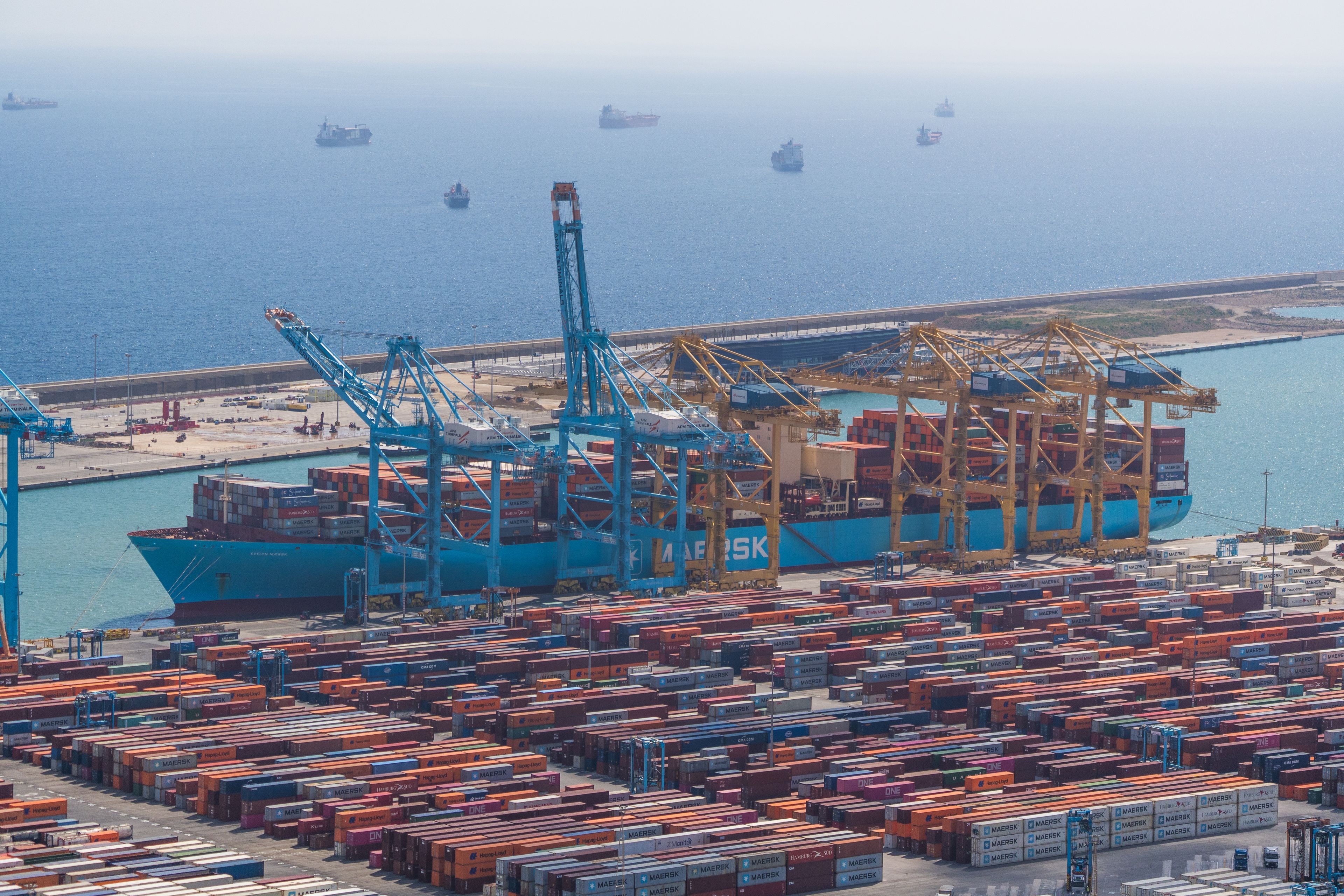 Aerial view of Barcelona's port with container ships and cranes