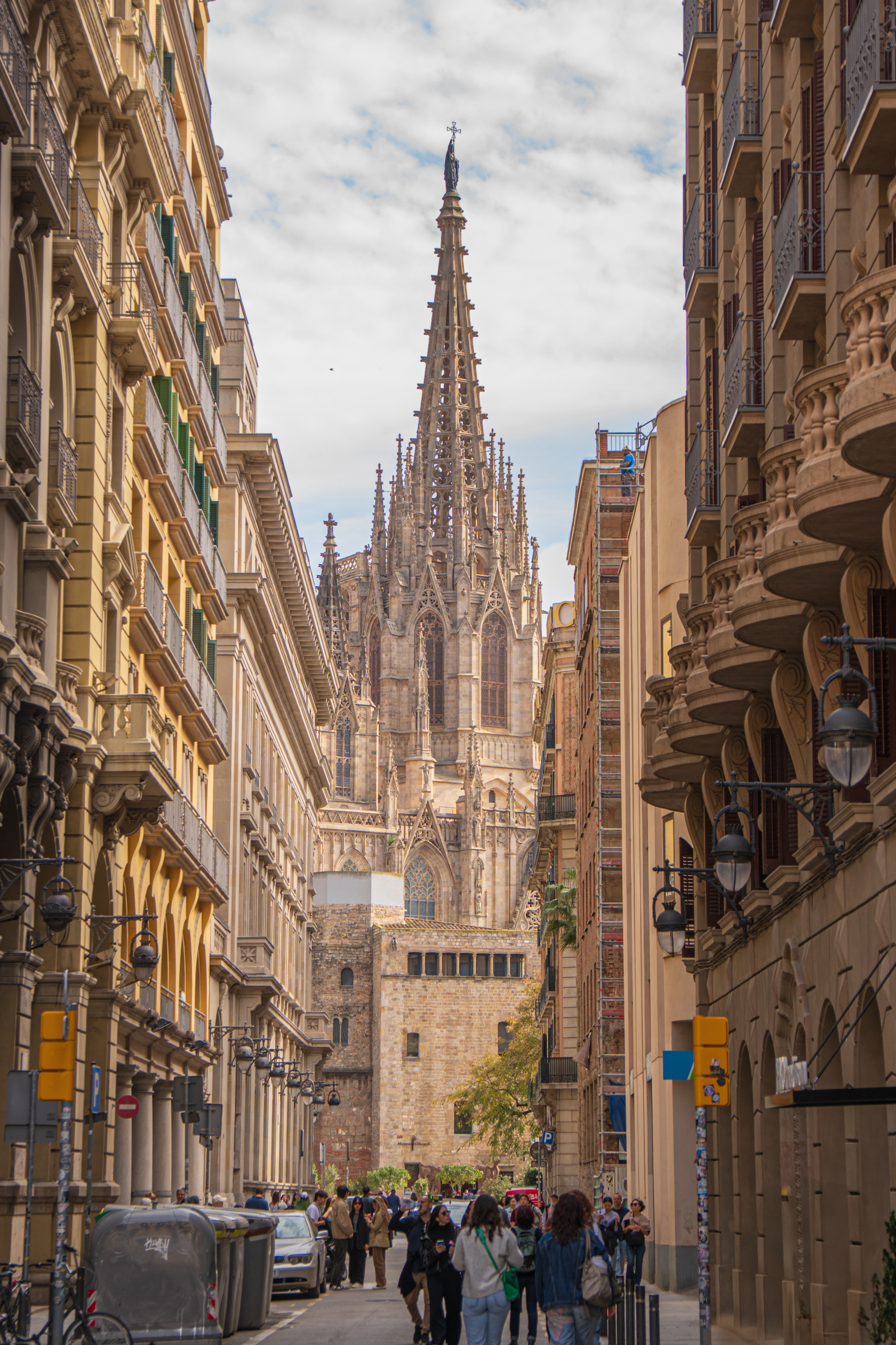 Barcelona Cathedral spire framed by narrow Gothic Quarter streets